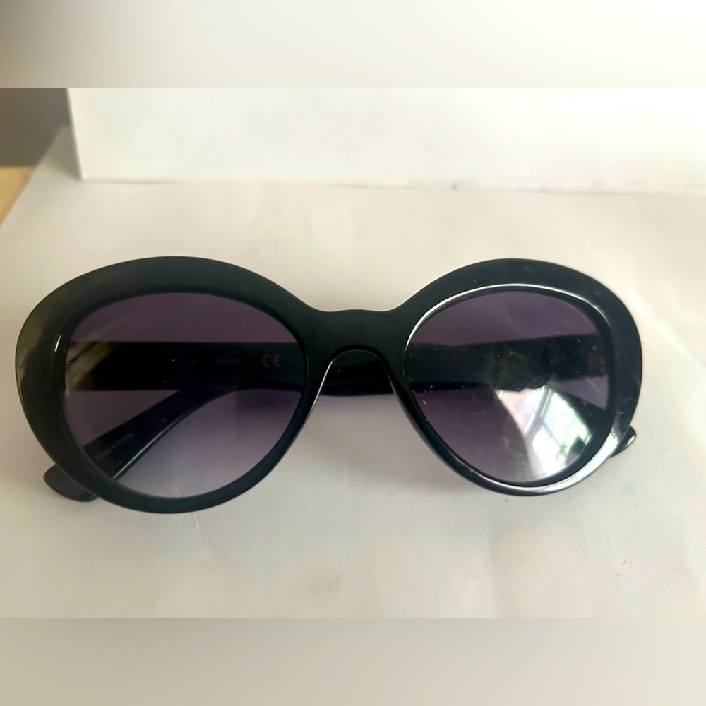 Guess Black Cat-Eye Sunglasses with gold trim and logo